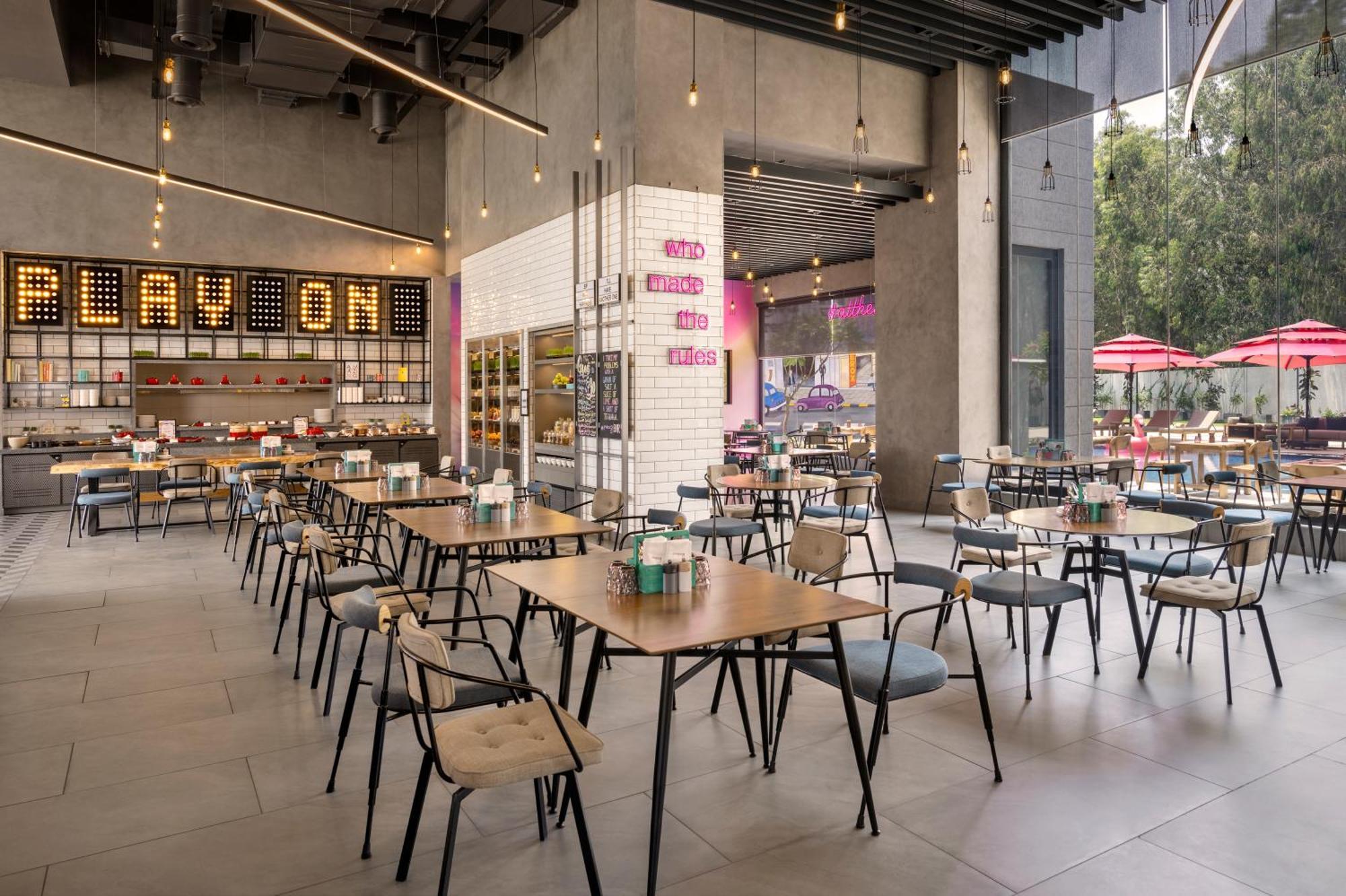 Отель Moxy Bengaluru Airport Prestige Tech Cloud Devanahalli Экстерьер фото