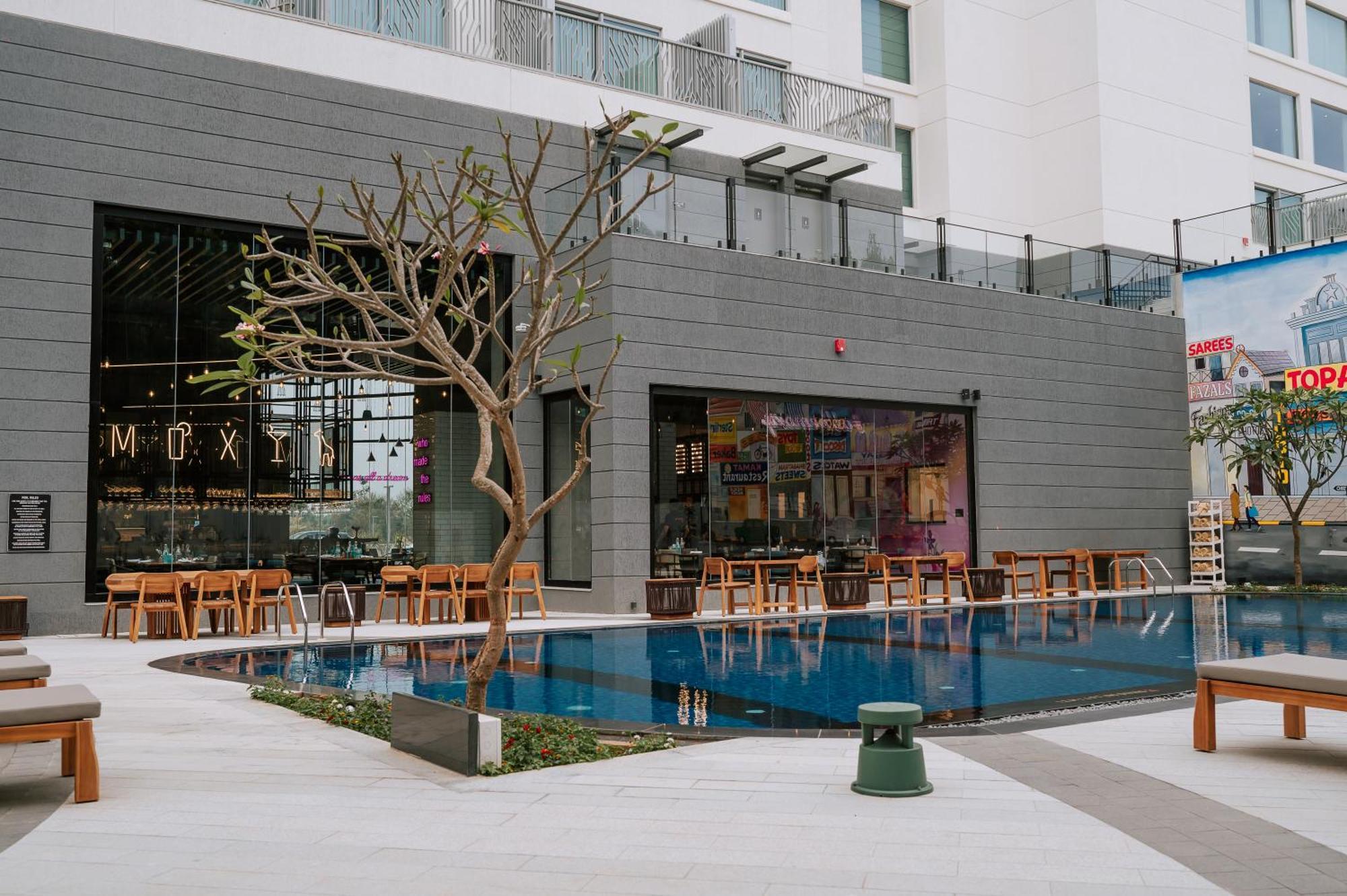 Отель Moxy Bengaluru Airport Prestige Tech Cloud Devanahalli Экстерьер фото