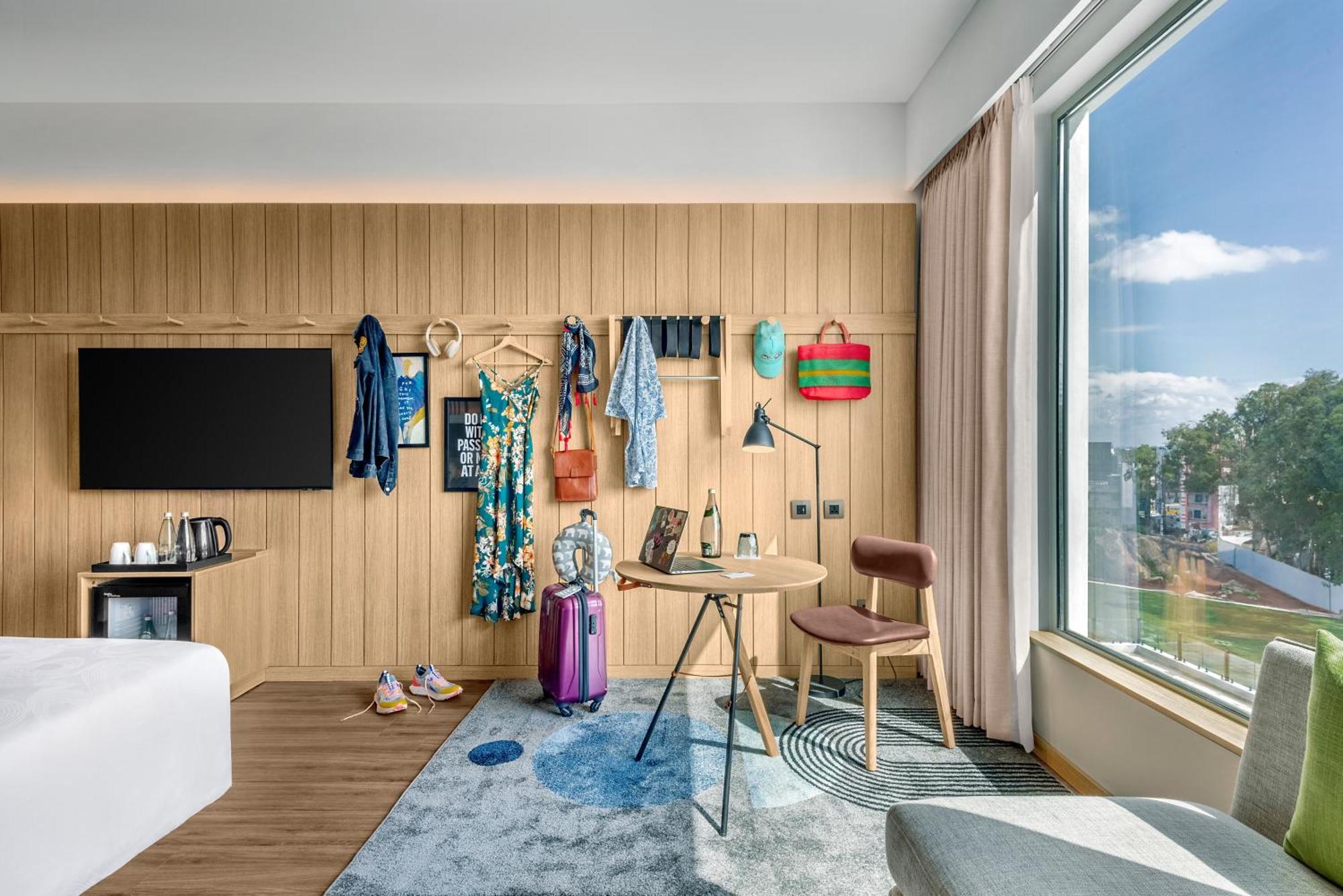 Отель Moxy Bengaluru Airport Prestige Tech Cloud Devanahalli Экстерьер фото